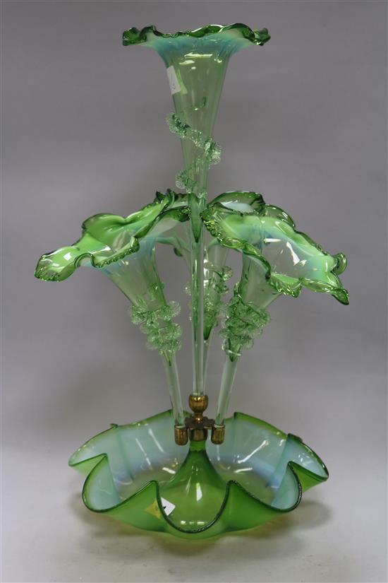 A green glass four branch centrepiece